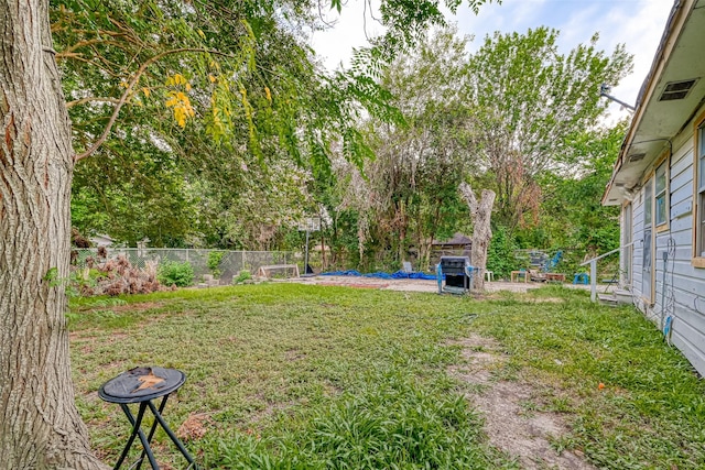 view of yard featuring fence