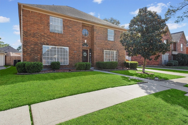 colonial-style house with brick siding and a front lawn