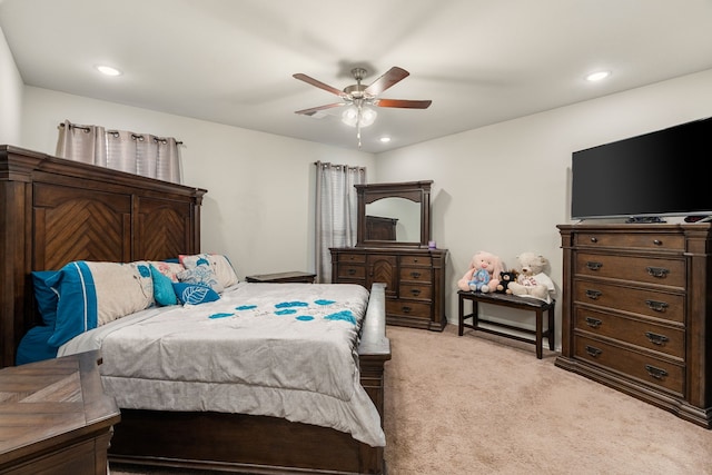 bedroom featuring recessed lighting, light colored carpet, and ceiling fan