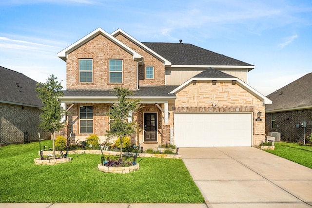 view of front of home with brick siding, central air condition unit, concrete driveway, a front yard, and a garage