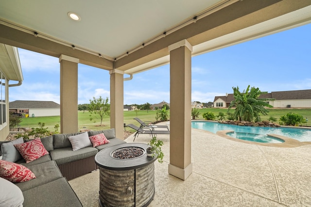 586 Ruby Dr, Bellville, TX 77418 - view of patio / terrace featuring an outdoor fire pit and a pool with connected hot tub