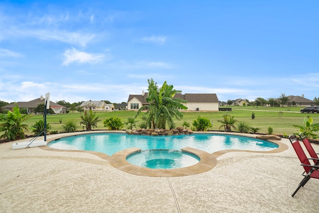 586 Ruby Dr, Bellville, TX 77418 - outdoor pool featuring a residential view, a patio area, a yard, and an in ground hot tub