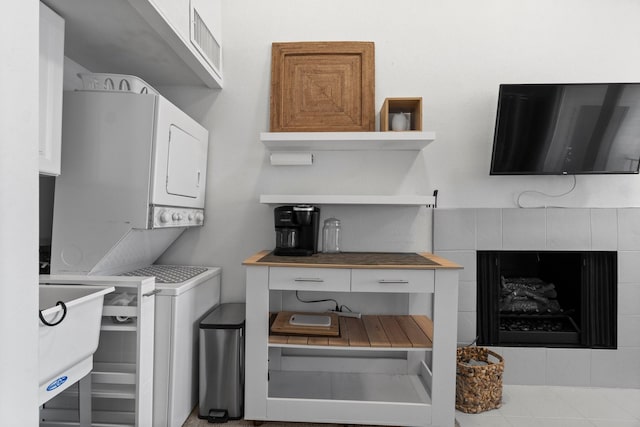 12600 Melville Dr Unit 316B, Montgomery, TX 77356 - laundry room featuring stacked washer and clothes dryer