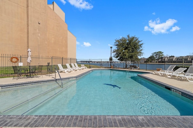 12600 Melville Dr Unit 316B, Montgomery, TX 77356 - community pool with fence and a patio area