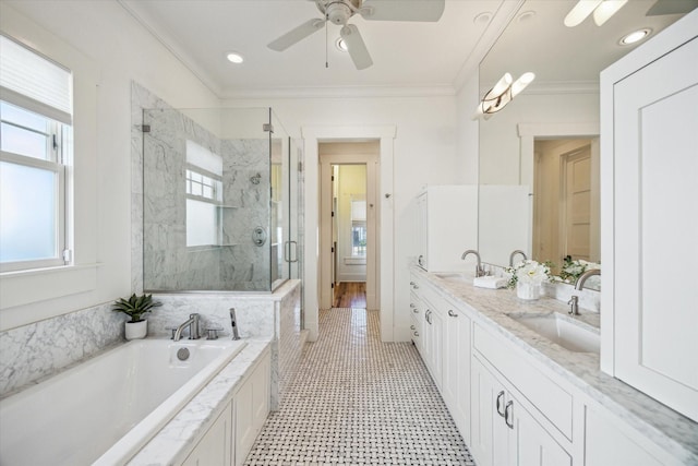 full bathroom with a marble finish shower, double vanity, ornamental molding, a sink, and a bath