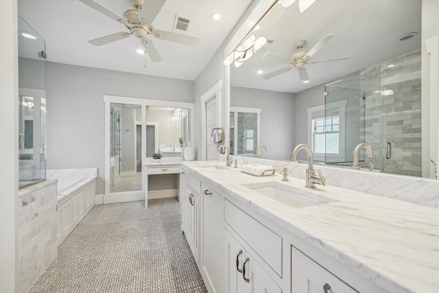 full bath featuring tile patterned flooring, visible vents, a sink, and a shower stall