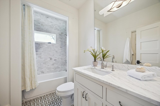 bathroom featuring shower / bathtub combination with curtain, vanity, and toilet