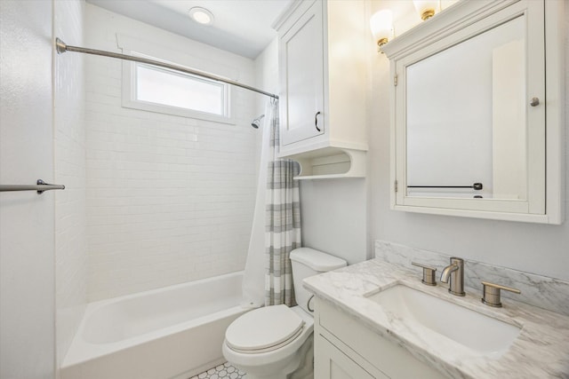 bathroom featuring vanity, toilet, and shower / tub combo with curtain