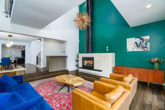 1016 Crocker St, Houston, TX 77019 - living area with dark wood-style floors, a notable chandelier, recessed lighting, visible vents, and a multi sided fireplace
