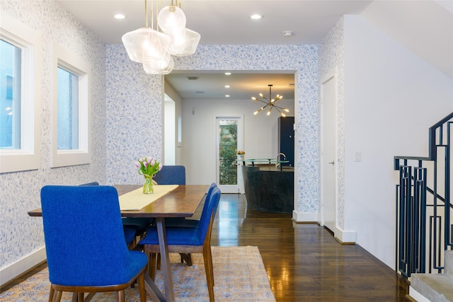 1016 Crocker St, Houston, TX 77019 - dining area featuring wallpapered walls, stairs, dark wood finished floors, and recessed lighting