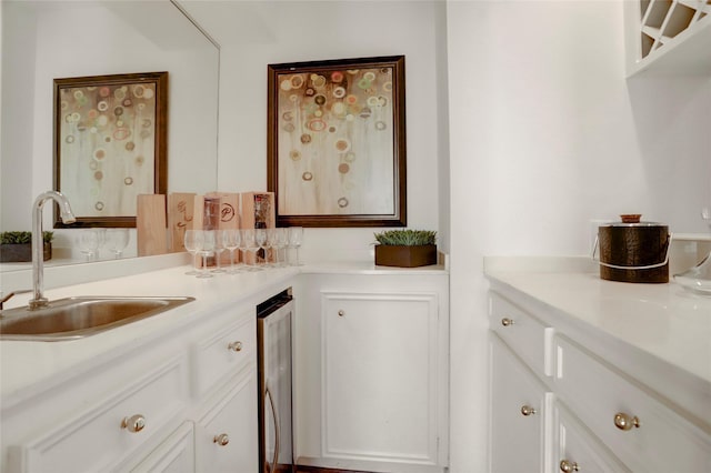 bathroom featuring beverage cooler and vanity