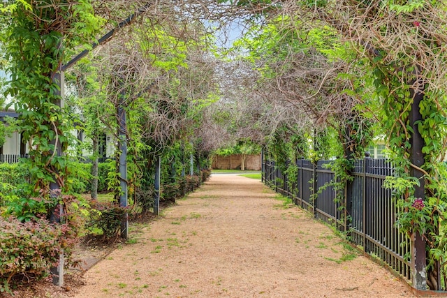 surrounding community with a fenced backyard