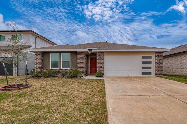 view of front of house with a garage, driveway, a front lawn, and brick siding