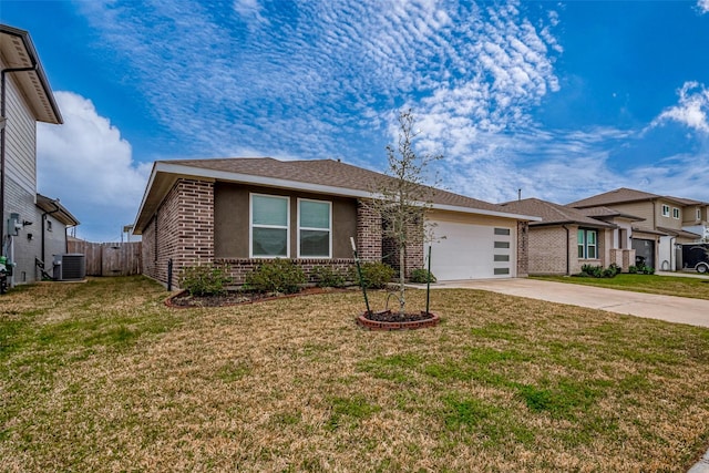 view of front of house featuring brick siding, concrete driveway, an attached garage, a front yard, and central AC