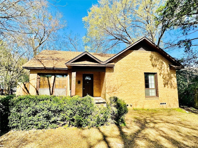 213 E Menefee St, Lufkin, TX 75901 - view of front facade with brick siding and crawl space