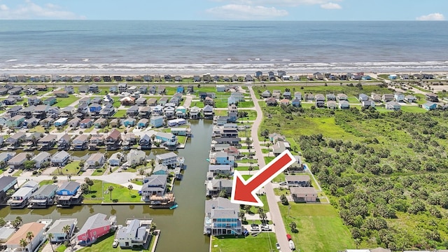 aerial view featuring a water view and a residential view