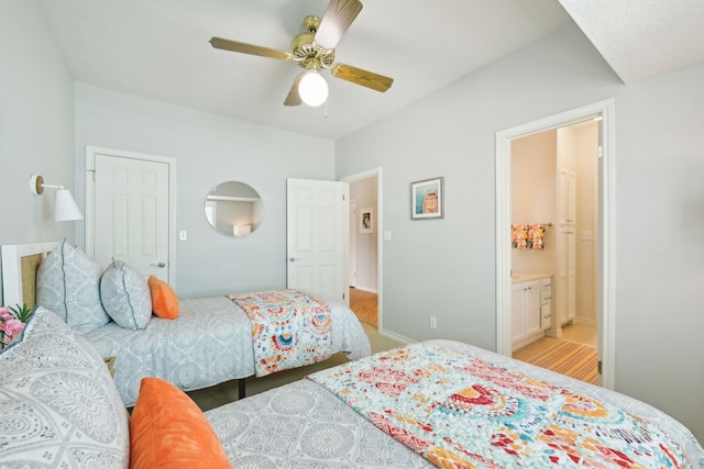4105 Nueces Dr, Galveston, TX 77554 - bedroom with a ceiling fan and connected bathroom