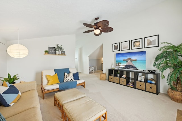4105 Nueces Dr, Galveston, TX 77554 - living area featuring lofted ceiling, carpet, baseboards, and a ceiling fan
