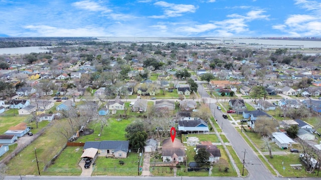 aerial view with a water view and a residential view