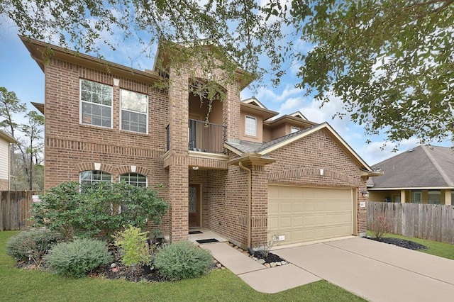 view of front of house featuring a garage, concrete driveway, a balcony, fence, and brick siding