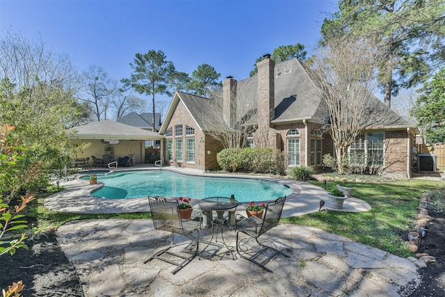 pool featuring a patio area