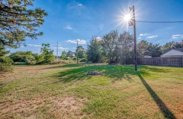 view of yard with fence