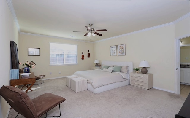 bedroom featuring light carpet, baseboards, and crown molding