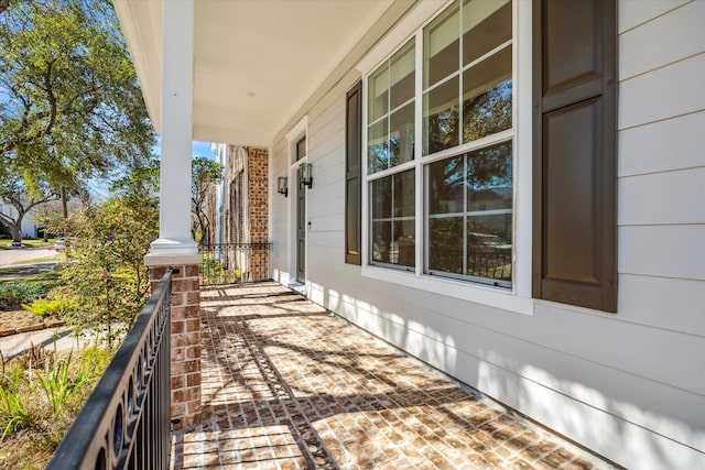 balcony featuring a porch