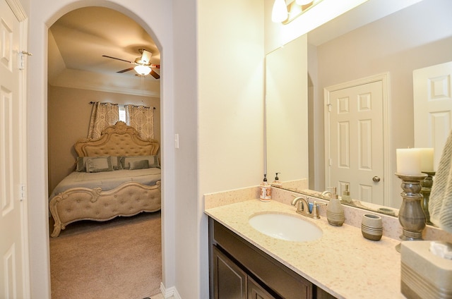 bathroom with ceiling fan and vanity