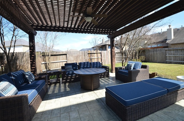 view of patio with a fenced backyard, an outdoor living space, and a pergola