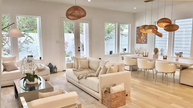 interior space featuring light wood-style floors, recessed lighting, and plenty of natural light