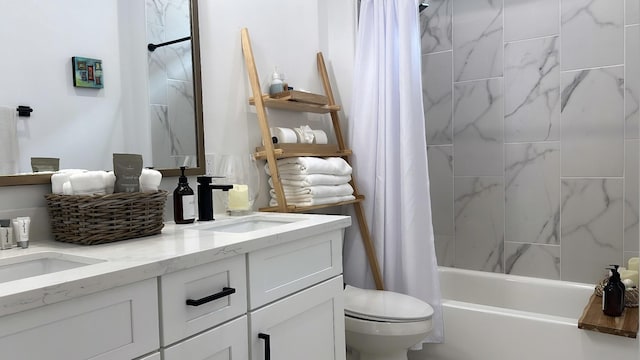 bathroom featuring shower / bath combo, a sink, toilet, and double vanity