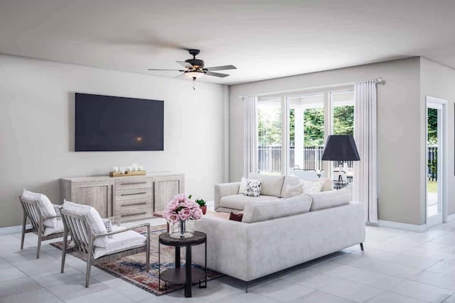 living room featuring a ceiling fan and baseboards