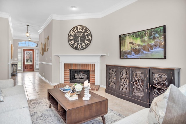 living area with baseboards, light tile patterned flooring, crown molding, and a fireplace