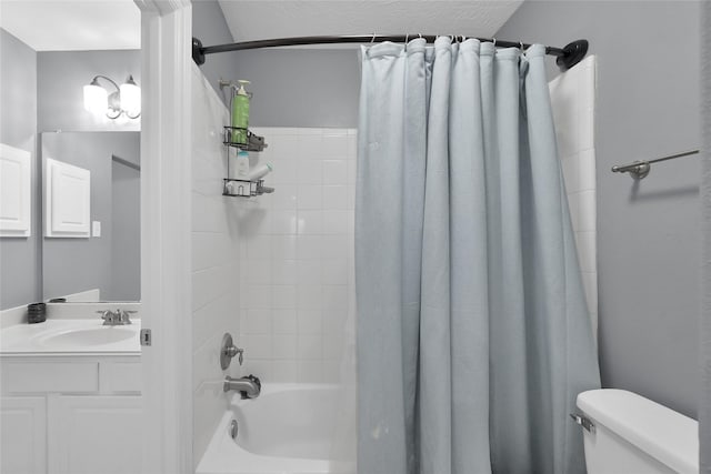 bathroom featuring vanity, toilet, and shower / bath combination with curtain