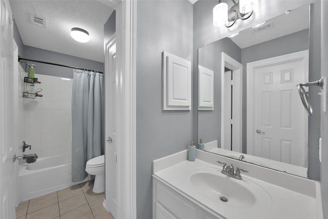 full bath with tile patterned flooring, shower / bathtub combination with curtain, visible vents, and a textured ceiling