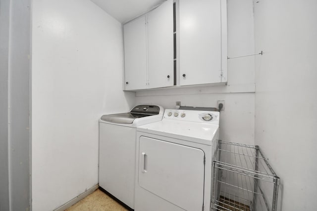 4900 Sandalwood Cir, Baytown, TX 77521 - clothes washing area with washing machine and dryer and cabinet space