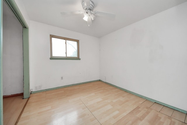 4900 Sandalwood Cir, Baytown, TX 77521 - unfurnished room featuring ceiling fan and light wood finished floors