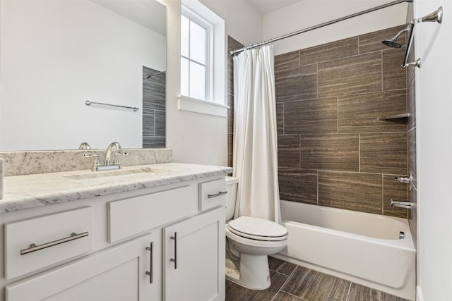 full bathroom featuring toilet, shower / bath combo with shower curtain, vanity, and wood tiled floor