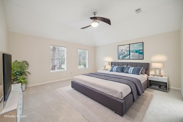 bedroom featuring visible vents, a ceiling fan, light carpet, vaulted ceiling, and baseboards