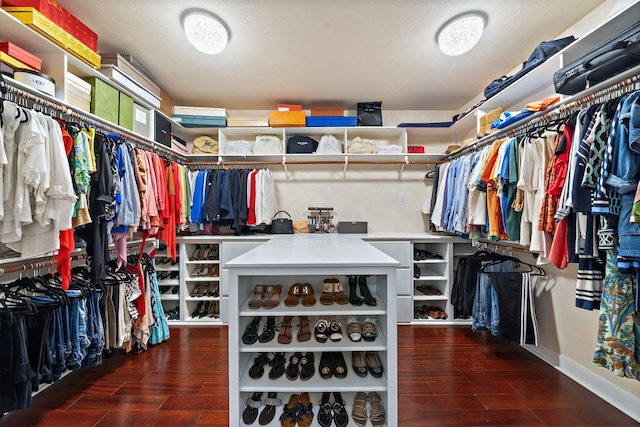 spacious closet featuring wood finish floors