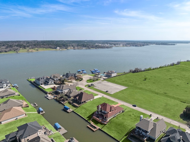 10804 Bourbon St, Willis, TX 77318 - aerial view featuring a residential view and a water view
