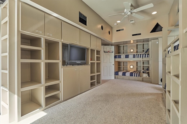 unfurnished living room with carpet floors, recessed lighting, visible vents, and a ceiling fan