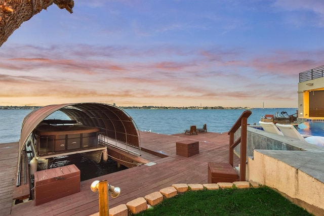 dock area with a water view