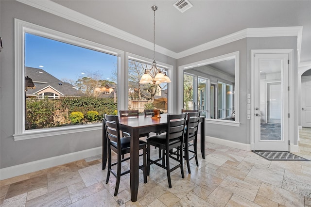 62 Kingwood Greens Dr, Kingwood, TX 77339 - dining area featuring stone tile floors, visible vents, and baseboards