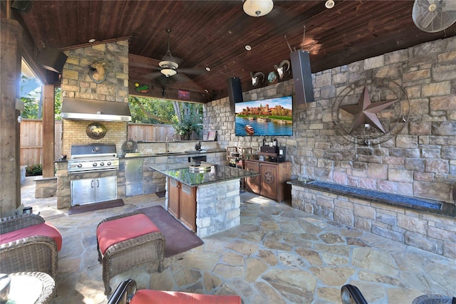 62 Kingwood Greens Dr, Kingwood, TX 77339 - view of patio with a gazebo, an outdoor kitchen, a sink, a grill, and fence