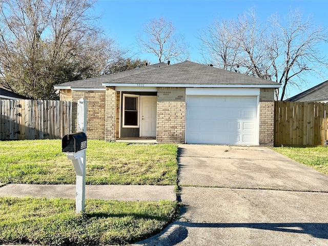 single story home featuring an attached garage, brick siding, fence, concrete driveway, and a front yard