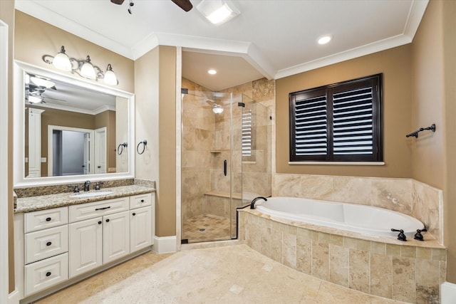 full bathroom featuring a ceiling fan, crown molding, a shower stall, and vanity