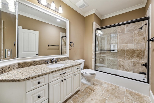 full bathroom with toilet, bath / shower combo with glass door, visible vents, vanity, and ornamental molding