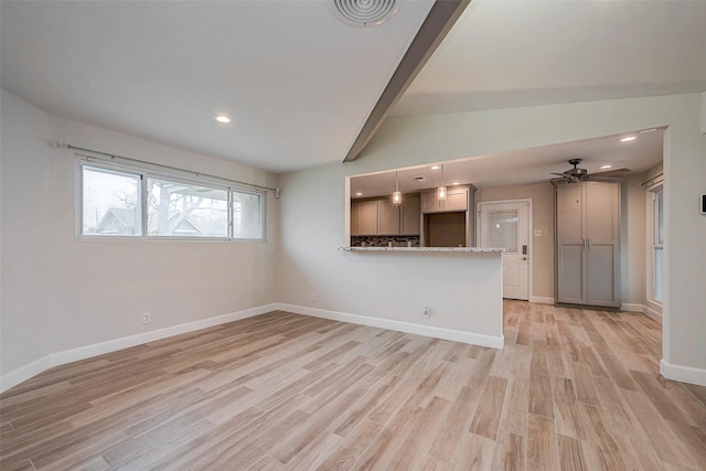 unfurnished living room with light wood-style flooring, recessed lighting, visible vents, baseboards, and vaulted ceiling